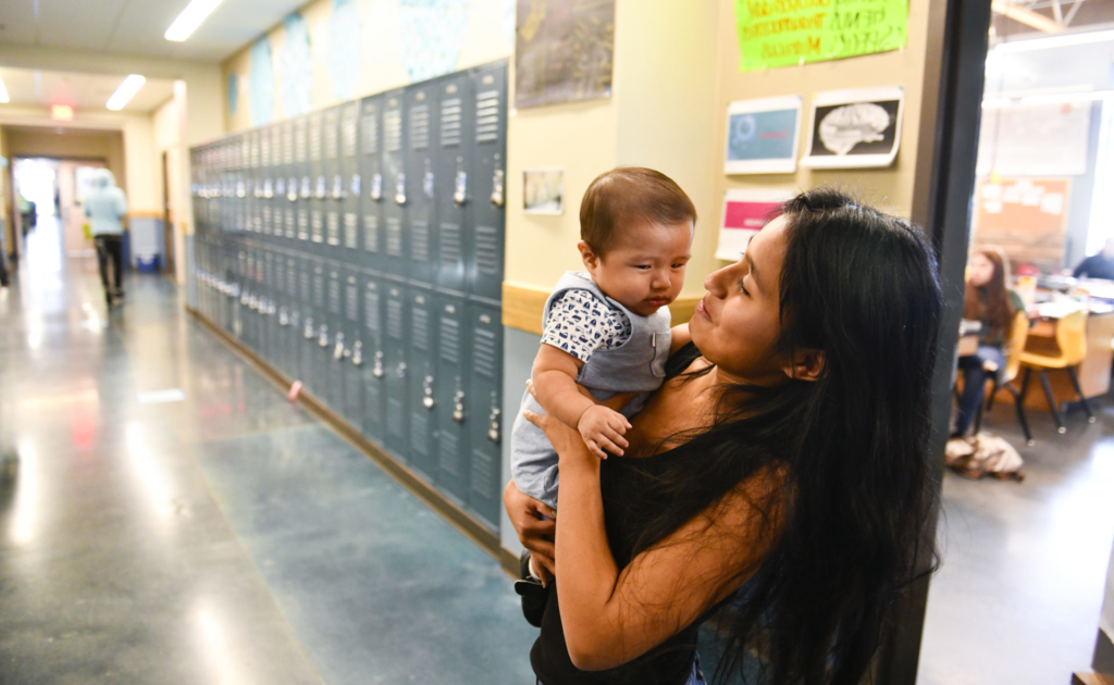 Baby held by FEBRUARY 4, 2019: AURORA, CO: Visit to New Legacy Charter School in Aurora and their field trip to the Children's Museum on Monday, February 4, 2019. (Photo by Cyrus McCrimmon for Gary Community Investments)