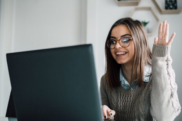 photo of a learner in front of a laptop