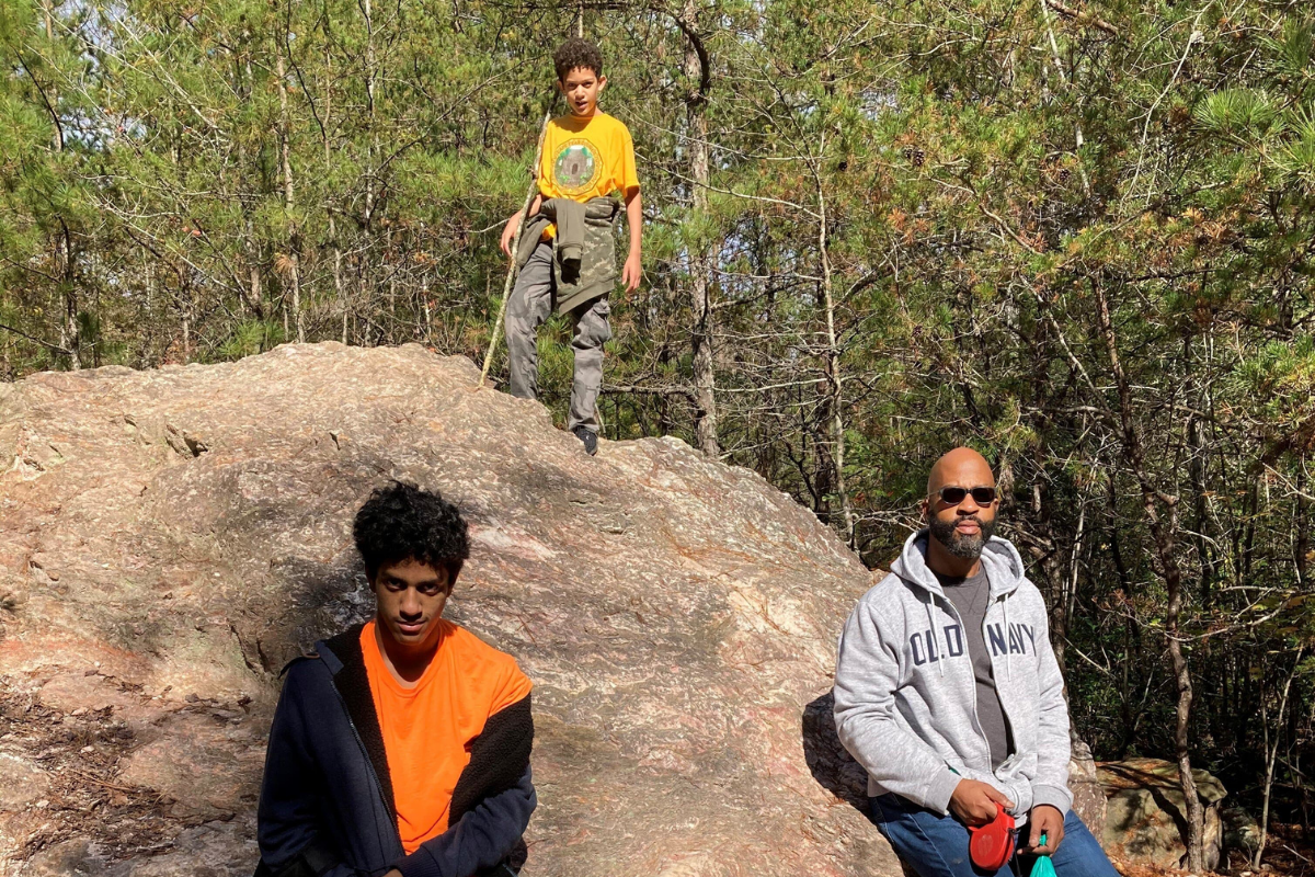 Dr. Craig Waleed with his two sons exploring the outdoors