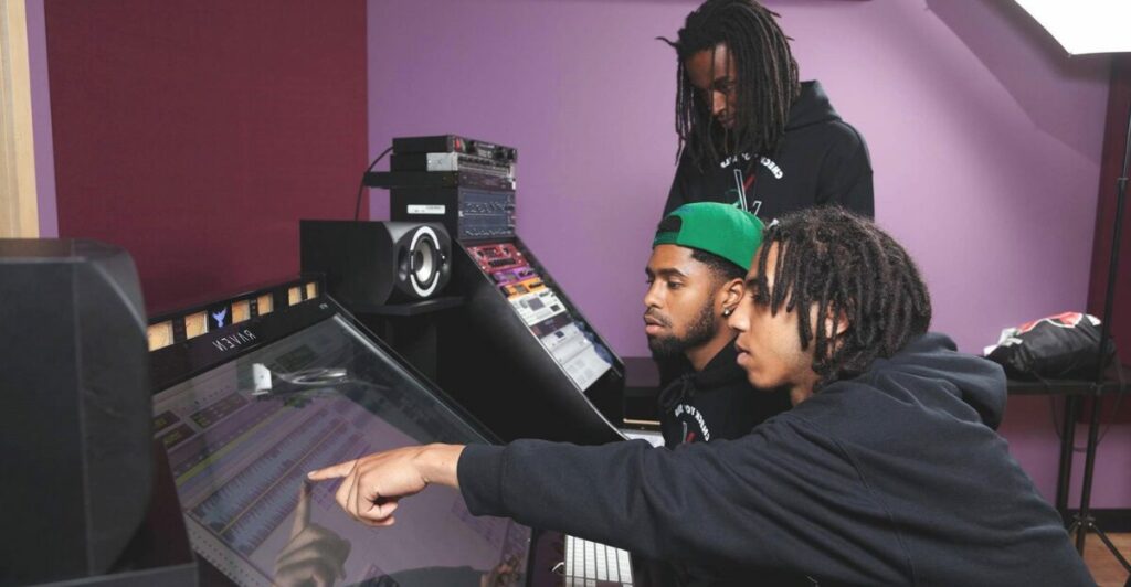 Learners from the High School for the Recording Arts in a recording studio