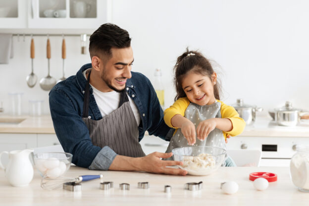 young learner baking with a practitioner