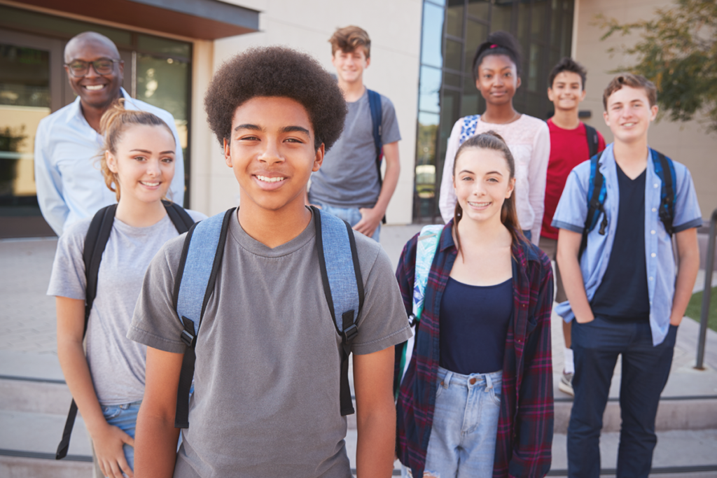 photo of a group of learners outside of a learning environment