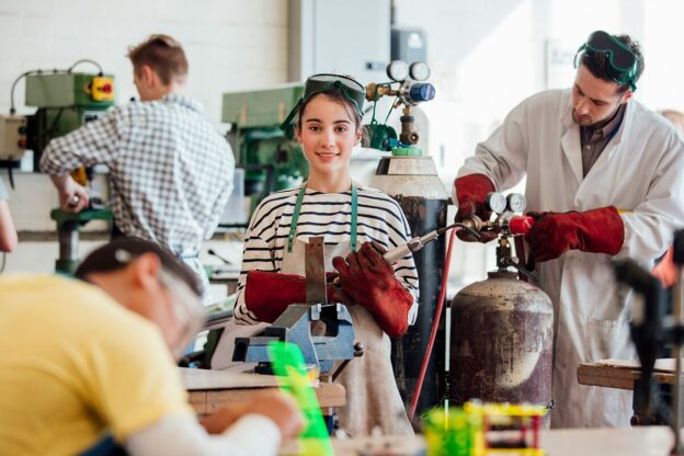 photo of a young learner in a shop work room