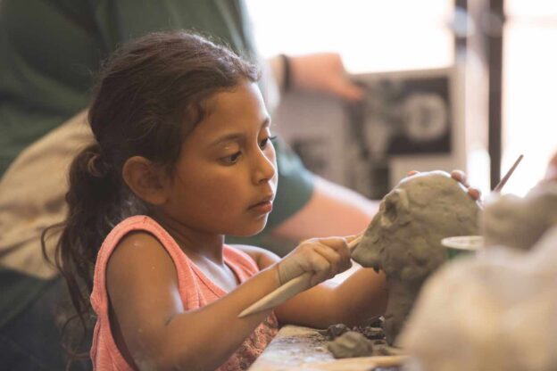 Rock Tree Sky learner sculpting with clay