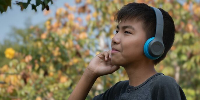 young learner wearing headphones